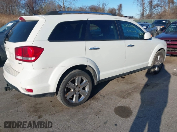 2013 Dodge Journey Crew with VIN 3C4PDCDG3DT521556, listed as a IAAI auction lot 41852888 with 209,562 mi miles and . Bid and sale history available at DreamBid. Image 4.