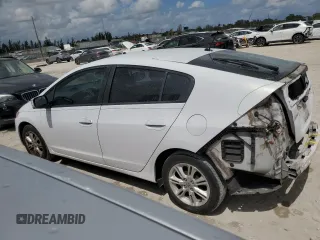 2010 Honda Insight EX with VIN JHMZE2H79AS038112, listed as a Copart auction lot 54794785 with 183,457 mi miles and Salvage Title. Bid and sale history available at DreamBid. Image 2.