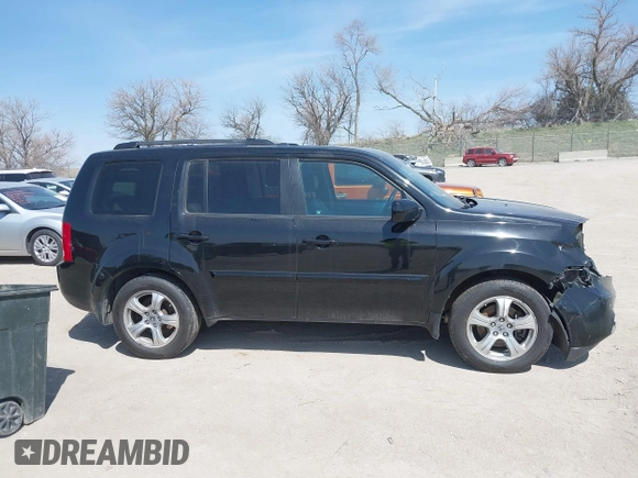 2012 Honda Pilot EX-L with VIN 5FNYF4H52CB085308, listed as a IAAI auction lot 41987301 with 180,877 mi miles and . Bid and sale history available at DreamBid. Image 14.