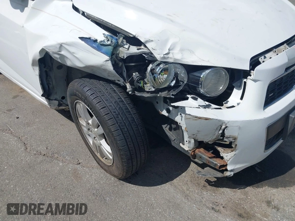 2014 Chevrolet Sonic LT with VIN 1G1JC5SH0E4232070, listed as a IAAI auction lot 41970353 with 140,557 mi miles and . Bid and sale history available at DreamBid. Image 6.