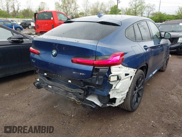 2023 BMW X4 xDrive30i z VIN 5UX33DT01P9P86340, wystawiony jako IAAI lot #42113558 z przebiegiem 27 226 mil mil oraz . Historia ofert i sprzedaży dostępna na DreamBid. Obrazek 4.