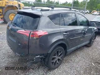 2016 Toyota RAV4 SE with VIN 2T3NFREV2GW309858, listed as a IAAI auction lot 42236828 with 129,602 mi miles and . Bid and sale history available at DreamBid. Image 4.