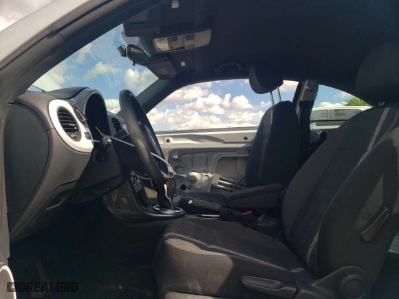 2018 Volkswagen Beetle SE with VIN 3VWJD7AT1JM717772, listed as a Copart auction lot 59819964 with 63,690 mi miles and Salvage Title. Bid and sale history available at carsss.com. Image 7.