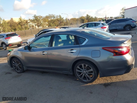 2018 Nissan Altima 2.5 SV with VIN 1N4AL3AP0JC136126, listed as a IAAI auction lot 41431759 with 170,825 mi miles. Bid and sale history available at carsss.com. Image 14.