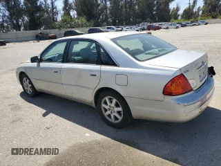 2001 Toyota Avalon XL z VIN 4T1BF28B11U154831, wystawiony jako Copart lot #57131435 z przebiegiem 211 745 mil mil oraz Szkody całkowita. Historia ofert i sprzedaży dostępna na DreamBid. Obrazek 2.