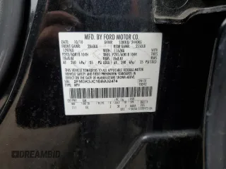 2011 Ford Edge SEL with VIN 2FMDK3JC1BBA32474, listed as a Copart auction lot 52149355 with 151,021 mi miles and Salvage Title. Bid and sale history available at carsss.com. Image 14.