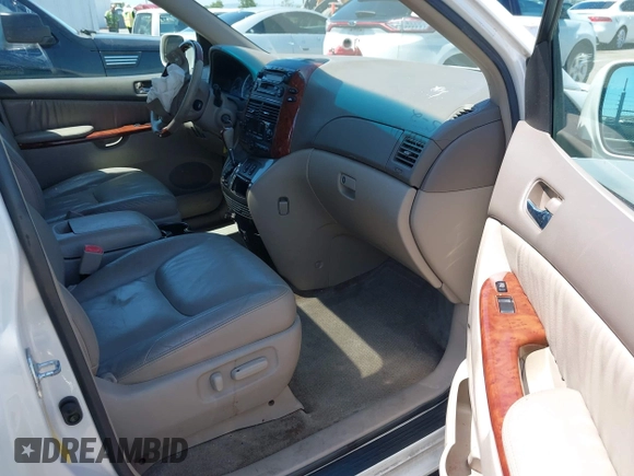 2005 Toyota Sienna XLE with VIN 5TDZA22C25S350614, listed as a IAAI auction lot 42179349 with 219,852 mi miles and . Bid and sale history available at carsss.com. Image 5.