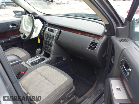 2009 Ford Flex SEL z VIN 2FMDK52CX9BA27679, wystawiony jako IAAI lot #41863371 z przebiegiem 170 993 mil mil oraz . Historia ofert i sprzedaży dostępna na DreamBid. Obrazek 5.