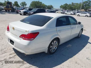 2006 Toyota Avalon XL with VIN 4T1BK36B06U078479, listed as a IAAI auction lot 41940266 with 168,852 mi miles. Bid and sale history available at carsss.com. Image 4.