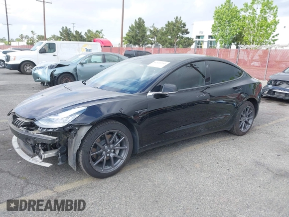 2019 Tesla Model 3 Mid Range with VIN 5YJ3E1EA3KF415601, listed as a IAAI auction lot 42125393 with 150,220 mi miles and . Bid and sale history available at carsss.com. Image 24.