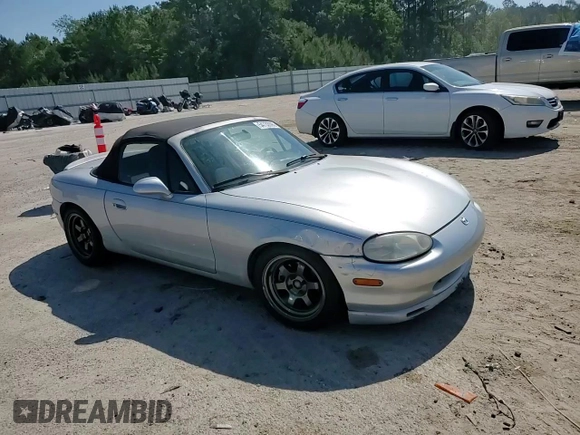 1999 Mazda MX-5 Miata z VIN JM1NB3538X0112611, wystawiony jako Copart lot #54732095 z przebiegiem 173 763 mil mil oraz Szkoda całkowita • Salvage title. Historia ofert i sprzedaży dostępna na DreamBid. Obrazek 13.