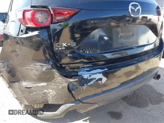2019 Mazda CX-5 Sport with VIN JM3KFABM7K1579747, listed as a IAAI auction lot 41965097 with 151,042 mi miles and . Bid and sale history available at DreamBid. Image 18.