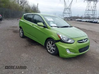 2013 Hyundai Accent SE with VIN KMHCU5AE1DU118738, listed as a IAAI auction lot 41947357 with 98,699 mi miles. Bid and sale history available at carsss.com. Image 1.
