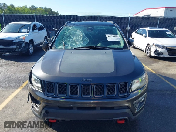 2018 Jeep Compass Trailhawk with VIN 3C4NJDDB3JT231923, listed as a IAAI auction lot 41929198 with 129,001 mi miles and . Bid and sale history available at carsss.com. Image 12.