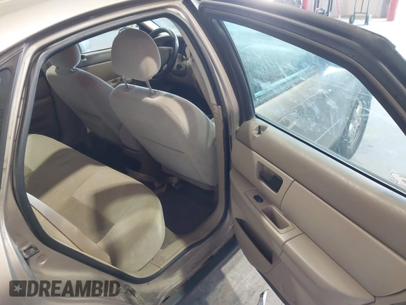 2006 Ford Taurus SE with VIN 1FAFP53U46A123827, listed as a IAAI auction lot 42042946 with 146,393 mi miles. Bid and sale history available at carsss.com. Image 8.