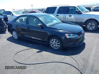 2011 Volkswagen Jetta SE z VIN 3VWDX7AJ2BM395485, wystawiony jako IAAI lot #42394788 z przebiegiem 193 979 mil mil oraz . Historia ofert i sprzedaży dostępna na DreamBid. Obrazek 1.
