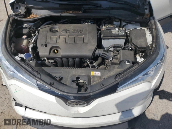 2018 Toyota C-HR XLE z VIN NMTKHMBX4JR031512, wystawiony jako Copart lot #55096715 z przebiegiem 100 522 mil mil oraz Szkoda całkowita • Salvage title. Historia ofert i sprzedaży dostępna na DreamBid. Obrazek 12.