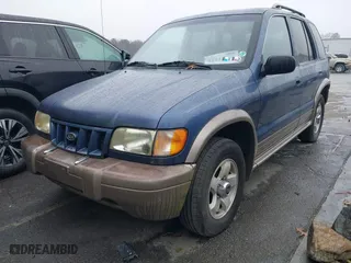 2002 Kia Sportage with VIN KNDJB723925161368, listed as a IAAI auction lot 41045568 with 168,167 mi miles. Bid and sale history available at carsss.com. Image 2.