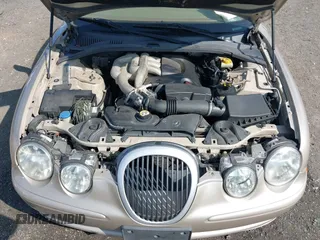 2005 Jaguar S-Type with VIN SAJWA01T95FN22745, listed as a IAAI auction lot 41898269 with 57,614 mi miles and . Bid and sale history available at DreamBid. Image 10.