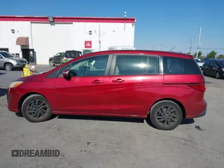 2014 Mazda 5 Sport with VIN JM1CW2BL9E0168662, listed as a IAAI auction lot 42726429 with 145,190 mi miles and . Bid and sale history available at DreamBid. Image 14.