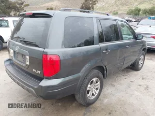 2004 Honda Pilot EX with VIN 2HKYF18494H619509, listed as a IAAI auction lot 42056926 with 185,600 mi miles and . Bid and sale history available at DreamBid. Image 4.