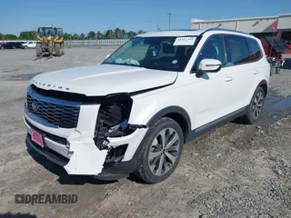 2020 Kia Telluride EX z VIN 5XYP34HCXLG071376, wystawiony jako IAAI lot #41992345 z przebiegiem 95 505 mil mil oraz . Historia ofert i sprzedaży dostępna na DreamBid. Obrazek 2.