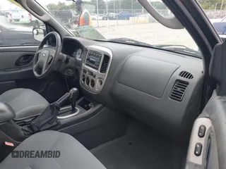 2006 Ford Escape XLT with VIN 1FMYU03156KA84031, listed as a IAAI auction lot 42276336 with 136,038 mi miles and . Bid and sale history available at DreamBid. Image 5.
