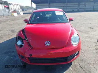 2012 Volkswagen Beetle 2.5L PZEV with VIN 3VWJP7AT0CM649068, listed as a IAAI auction lot 41684217 with 135,829 mi miles. Bid and sale history available at carsss.com. Image 12.