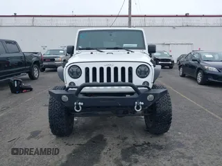 2014 Jeep Wrangler Unlimited Rubicon with VIN 1C4BJWFGXEL283929, listed as a IAAI auction lot 41812052 with 137,790 mi miles and . Bid and sale history available at DreamBid. Image 6.