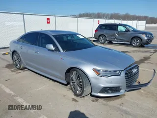 2018 Audi A6 Prestige with VIN WAUH3AFC9JN047482, listed as a IAAI auction lot 41763615 with 69,678 mi miles and . Bid and sale history available at DreamBid. Image 1.