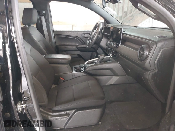 2023 Chevrolet Colorado 4WD Trail Boss with VIN 1GCPTEEK3P1261771, listed as a IAAI auction lot 42535710 with 30,000 mi miles and . Bid and sale history available at DreamBid. Image 5.