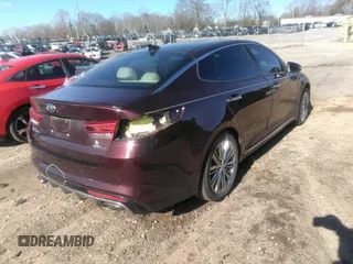 2016 Kia Optima SXL Turbo with VIN 5XXGV4L2XGG085829, listed as a IAAI auction lot 41789911 with 50,958 mi miles. Bid and sale history available at carsss.com. Image 4.