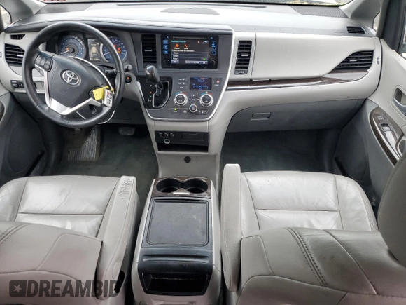 2015 Toyota Sienna XLE with VIN 5TDYK3DC4FS659692, listed as a Copart auction lot 57248355 with 121,644 mi miles and Salvage title. Bid and sale history available at DreamBid. Image 8.