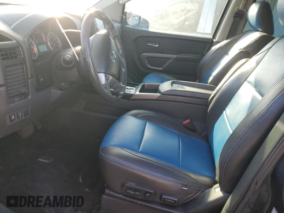 2015 Nissan Titan SL with VIN 1N6AA0ED7FN510609, listed as a Copart auction lot 74371254 with 115,916 mi miles and Salvage Title. Bid and sale history available at carsss.com. Image 7.