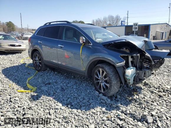 2015 Mazda CX-9 Grand Touring with VIN JM3TB2DA1F0469734, listed as a Copart auction lot 48728895 with 0 mi miles and Salvage Title. Bid and sale history available at carsss.com. Image 4.