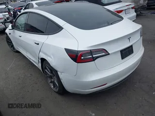 2022 Tesla Model 3 with VIN 5YJ3E1EA7NF108758, listed as a IAAI auction lot 41824437 with Not Provided miles. Bid and sale history available at carsss.com. Image 3.