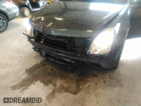2013 Cadillac CTS Luxury with VIN 1G6DE5E54D0156491, listed as a IAAI auction lot 39844556 with 104,089 mi miles and . Bid and sale history available at DreamBid. Image 6.