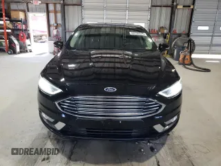 2018 Ford Fusion Titanium с VIN 3FA6P0D9XJR241506, выставлен на аукционе Copart как лот 60736525 с пробегом 109 548 миль миль и Списание • Salvage title. История ставок и продаж доступна на DreamBid. Изображение 5.