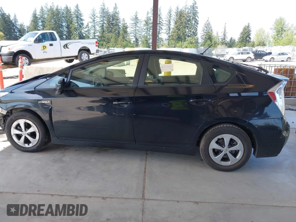 2015 Toyota Prius Four with VIN JTDKN3DU1F1899480, listed as a IAAI auction lot 42127015 with 247,659 mi miles and . Bid and sale history available at DreamBid. Image 15.