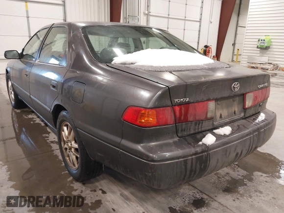 2001 Toyota Camry LE z VIN JT2BF28K110307972, wystawiony jako IAAI lot #41652522 z przebiegiem 201 631 mil mil oraz . Historia ofert i sprzedaży dostępna na DreamBid. Obrazek 3.