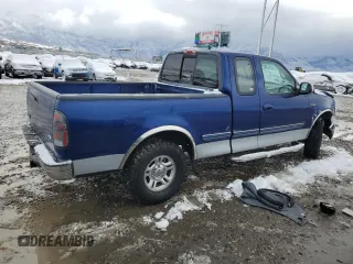 1997 Ford F-150 XL with VIN 1FTEX17LXVKB44786, listed as a Copart auction lot 49630955 with 301,736 mi miles and Salvage title. Bid and sale history available at DreamBid. Image 3.