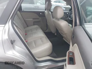 2008 Ford Taurus SEL with VIN 1FAHP24W78G105183, listed as a IAAI auction lot 41441086 with 215,758 mi miles. Bid and sale history available at carsss.com. Image 8.