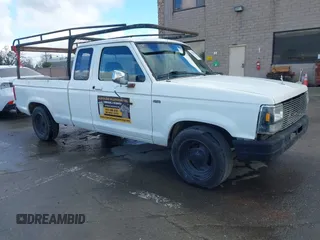 1991 Ford Ranger XL z VIN 1FTCR14U7MPA92484, wystawiony jako IAAI lot #41735962 z przebiegiem 29 049 mil mil oraz . Historia ofert i sprzedaży dostępna na DreamBid. Obrazek 1.