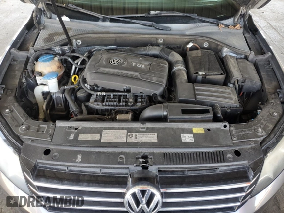 2014 Volkswagen Passat SE z VIN 1VWBT7A32EC090871, wystawiony jako Copart lot #57350735 z przebiegiem 106 002 mil mil oraz Czysty tytuł • Clean title. Historia ofert i sprzedaży dostępna na DreamBid. Obrazek 11.