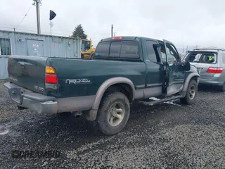 2000 Toyota Tundra Limited with VIN 5TBBT4812YS031675, listed as a IAAI auction lot 41626727 with 257,195 mi miles. Bid and sale history available at carsss.com. Image 4.