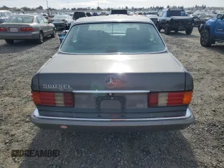 1990 Mercedes-Benz 560 with VIN WDBCA39E3LA553622, listed as a Copart auction lot 81530904 with 142,614 mi miles and Clean Title. Bid and sale history available at DreamBid. Image 6.