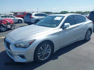 2019 Infiniti Q50 Luxe z VIN JN1EV7AP3KM510305, wystawiony jako IAAI lot #42225255 z przebiegiem 33 902 mil mil oraz . Historia ofert i sprzedaży dostępna na DreamBid. Obrazek 2.
