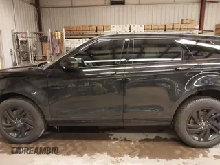 2023 Land Rover Range Rover Evoque Core S z VIN SALZJ2FXXPH210517, wystawiony jako IAAI lot #41642884 z przebiegiem 26 685 mil mil oraz . Historia ofert i sprzedaży dostępna na DreamBid. Obrazek 14.