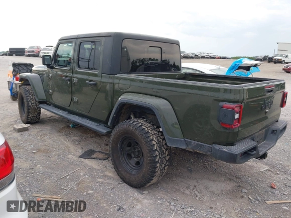 2022 Jeep Gladiator Texas Trail z VIN 1C6HJTAG1NL105124, wystawiony jako IAAI lot #42601707 z przebiegiem 52 064 mil mil oraz . Historia ofert i sprzedaży dostępna na DreamBid. Obrazek 3.