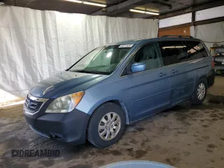 2009 Honda Odyssey EX with VIN 5FNRL38469B030870, listed as a Copart auction lot 66011635 with 154,383 mi miles and Clean title. Bid and sale history available at DreamBid. Image 1.